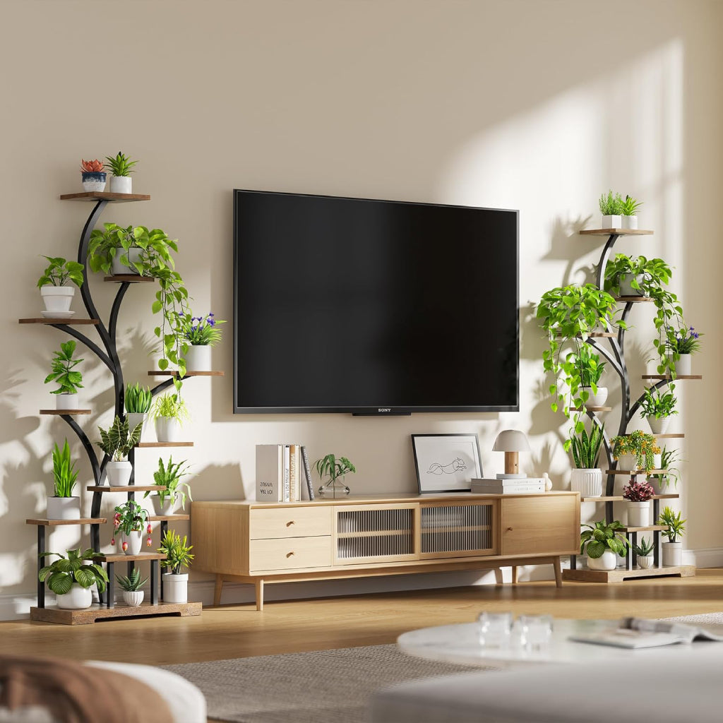Two plant stands are placed symmetrically on both sides of the TV