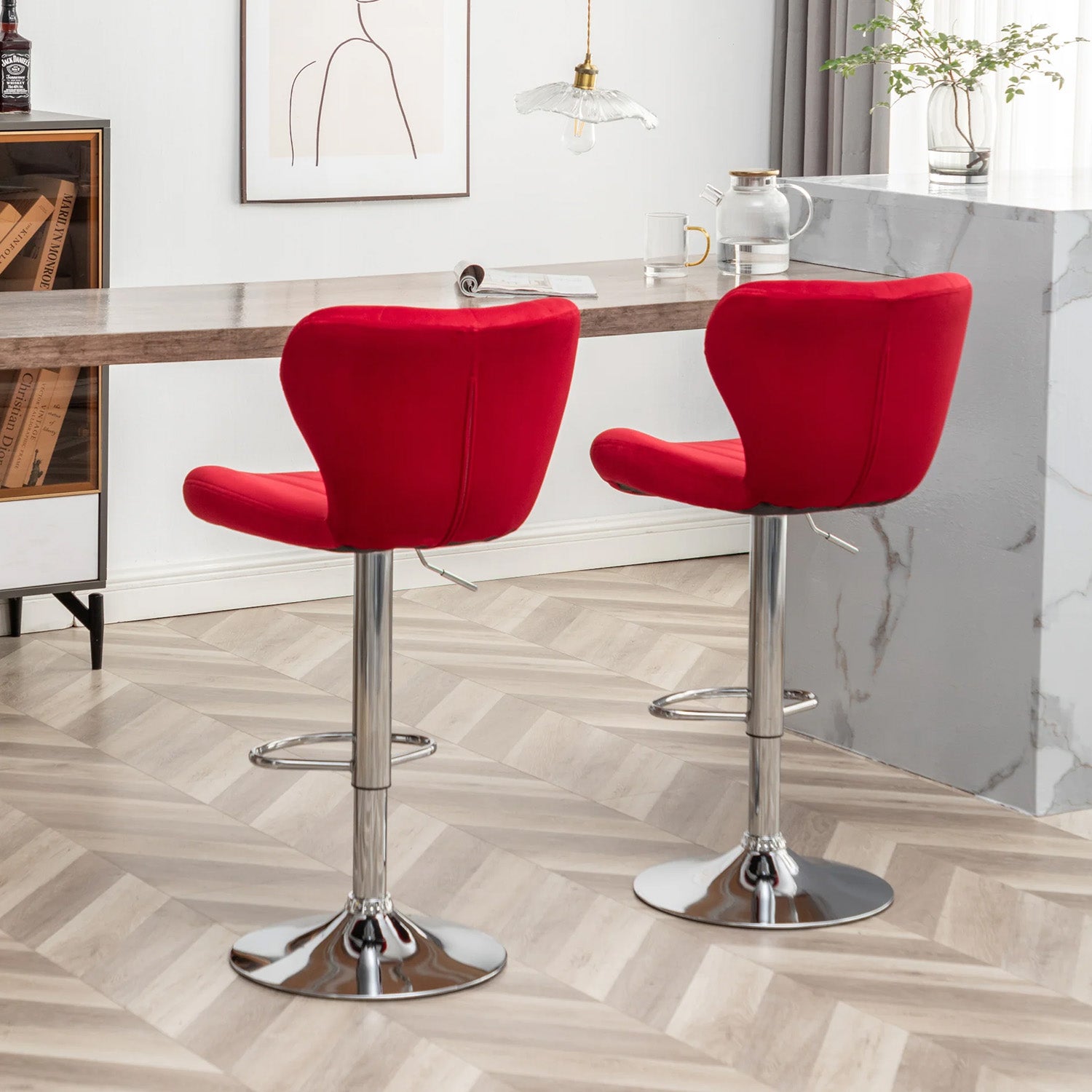 Two red swivel bar stools