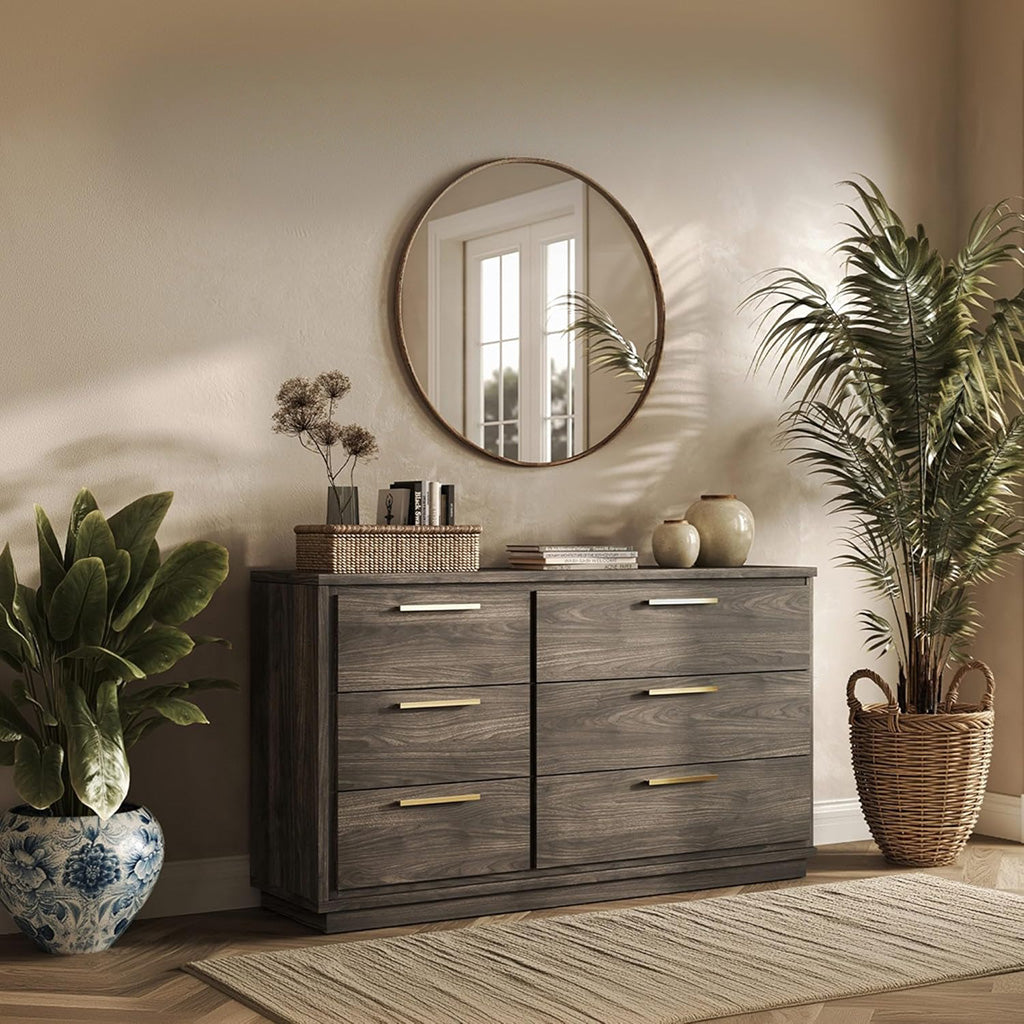 A mirror hangs above the 6-drawer dresser