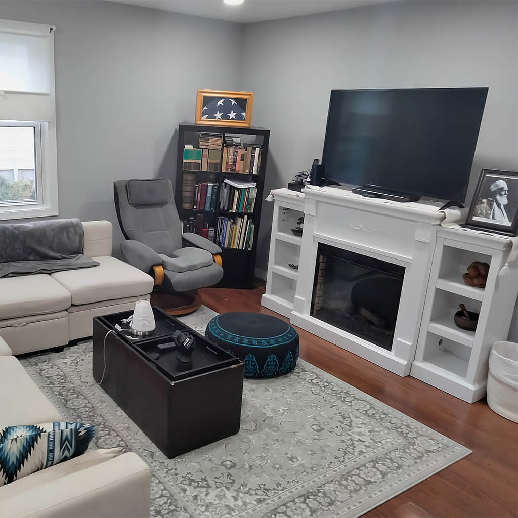 Small living room with fireplace TV stand and sofa
